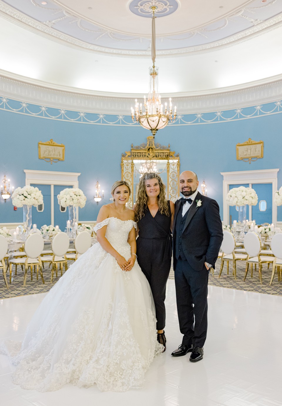Bride, groom and Ottawa Wedding Planner in the Adam room of Chateau Laurier photo by Grey Loft Studio
