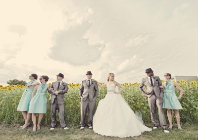 Bridal party with sunglasses in a field | Sala San Marco | Renaissance Studios