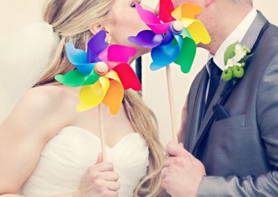 Bride and Groom with colorful pinwheels | Sala San Marco | Renaissance Studios