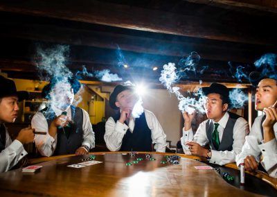 Groom and groomsmen smoking cigars photo | Stonefields Heritage Farm | Themotions Photography