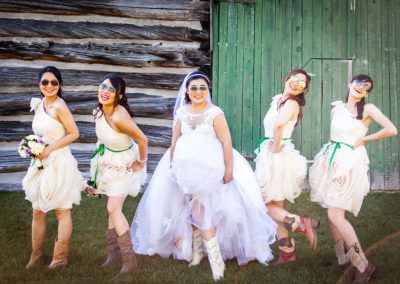 Bride and bridesmaid cowboy boots | Stonefields Heritage Farm | Themotions Photography