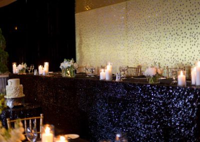 Headtable with lit backdrop and black sequins linens | Fairmont Chateau Montebello | Urban Bent Studio