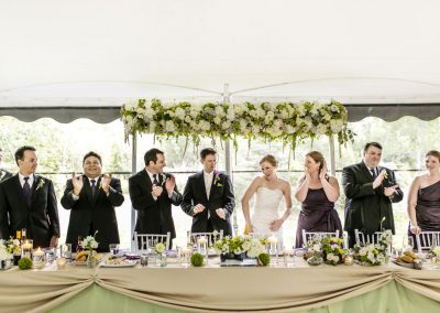 Headtable green with floral arch | Private Residence Wedding | Union Eleven Photographers