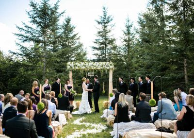 Ceremony floral arbour hay bails petal aisle | Private Residence Wedding | Union Eleven Photographers