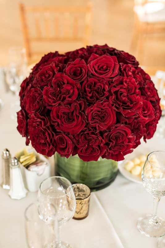 Red velvet baccara rose centerpiece gold mercury candle | Canadian Museum of Nature | Union Eleven Photographers Red velvet baccara rose centerpiece gold mercury candle | Canadian Museum of Nature | Union Eleven Photographers