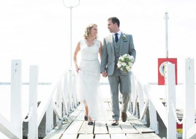 Bride and Groom Walking on Pier | Rivermead Ottawa | AMBphoto