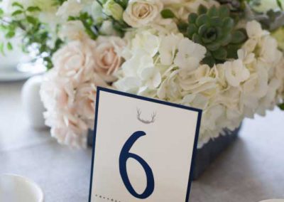 Small log table number holder with cream greenery succulents centerpiece| Rivermead Golf Club Ottawa | AMBphoto